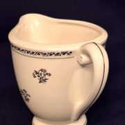 Antique milk jug in Gien earthenware, Valence model A040.