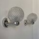 Pair of vintage wall lights in chrome metal and pressed moulded glass, France, 70s.
