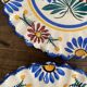 Henriot Quimper dessert plates, hand-painted earthenware.