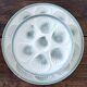 Set of 11 + 1 oyster plates Moulin des Loups