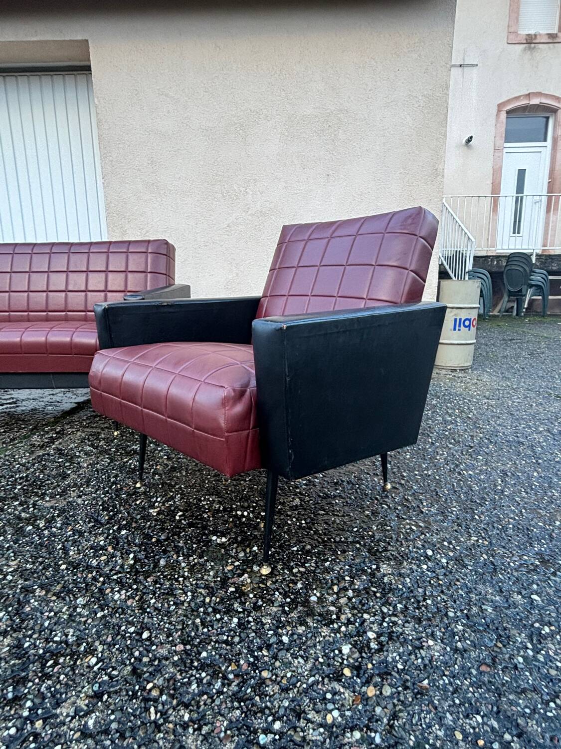 Vintage 70s red and black embossed sofa armchair set