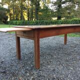 Table de ferme vintage en cerisier massif à 2 tiroirs et 1 tirette à pain.