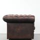 Dark brown cow leather vintage 2-seater Chesterfield sofa in English style