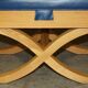 David Linley Hall bench in ostrich leather and satinwood with storage.