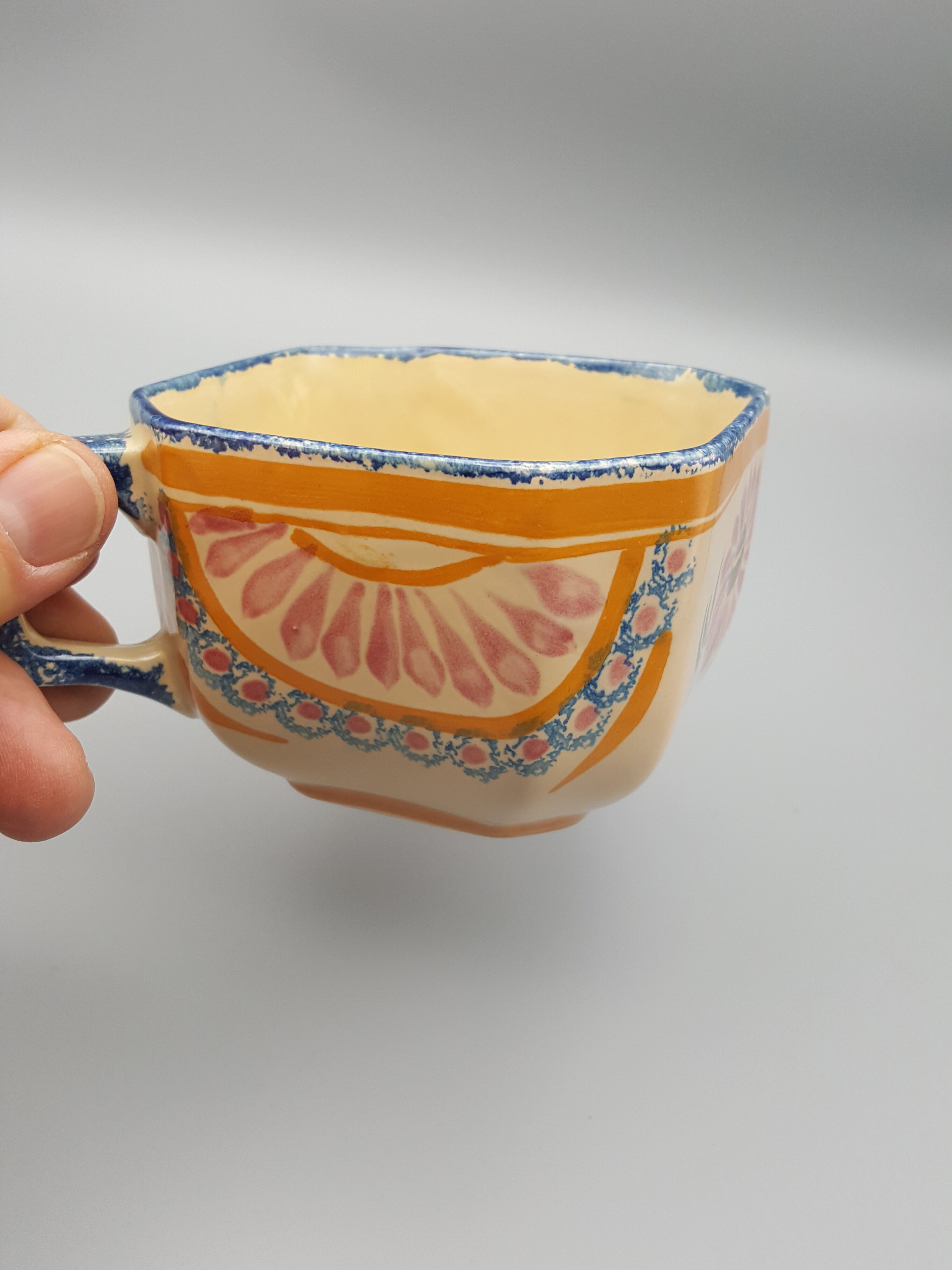 cups with octagonal saucers Henriot Quimper flower decoration leaves flowers