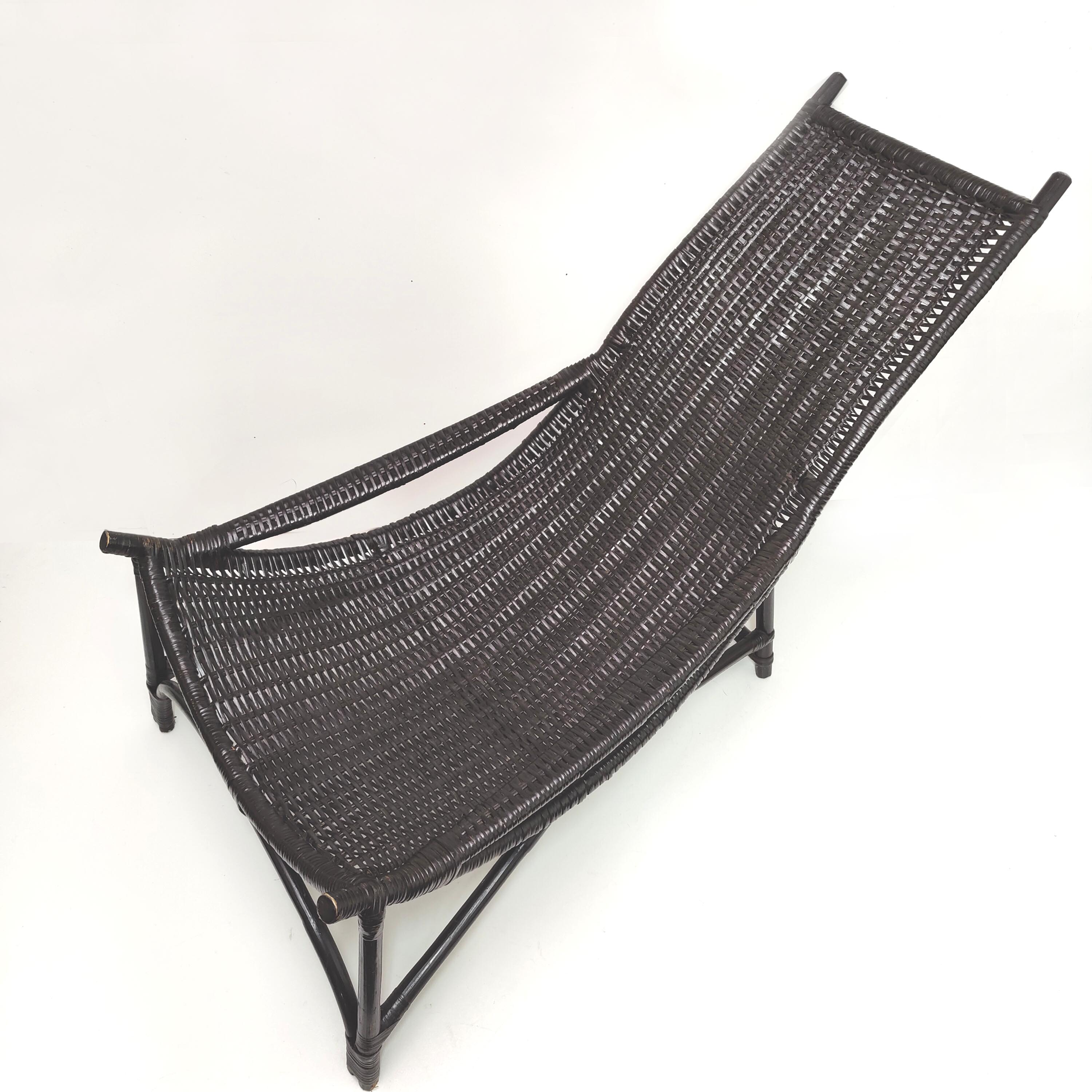 Vintage black rattan deck chair