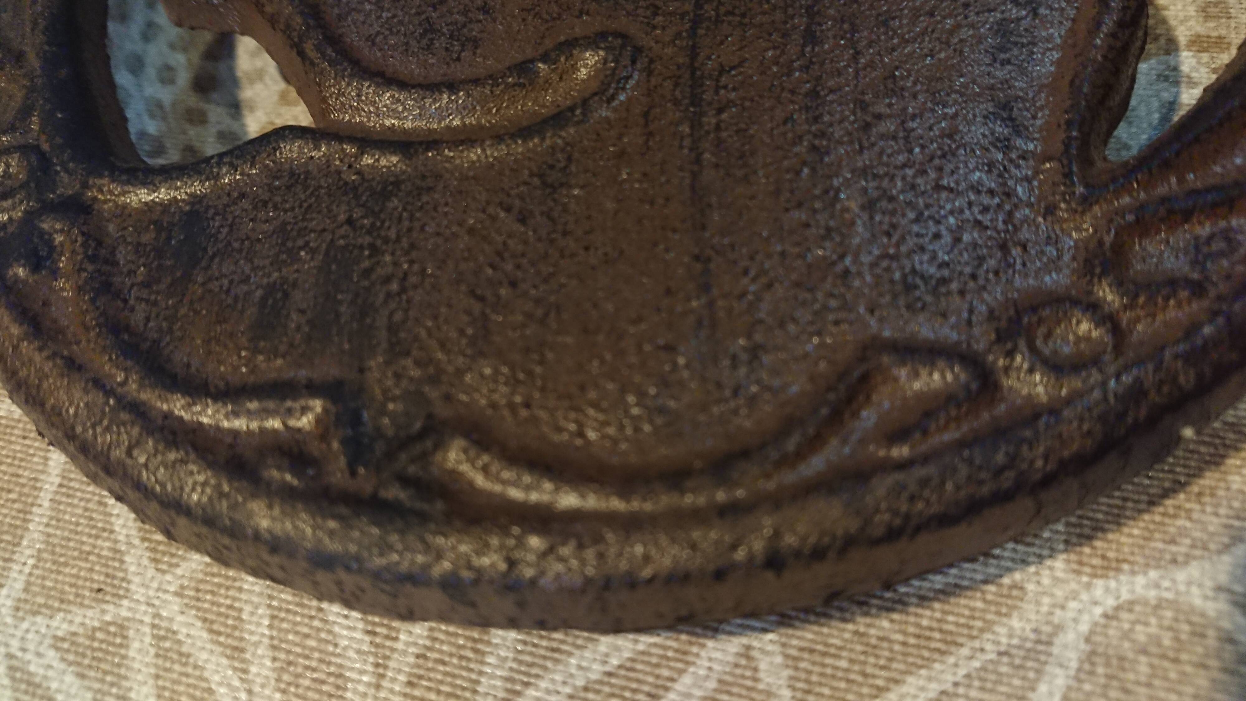 Taurus cast iron table mat