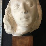 Bronze-middle-aged woman's head in plaster