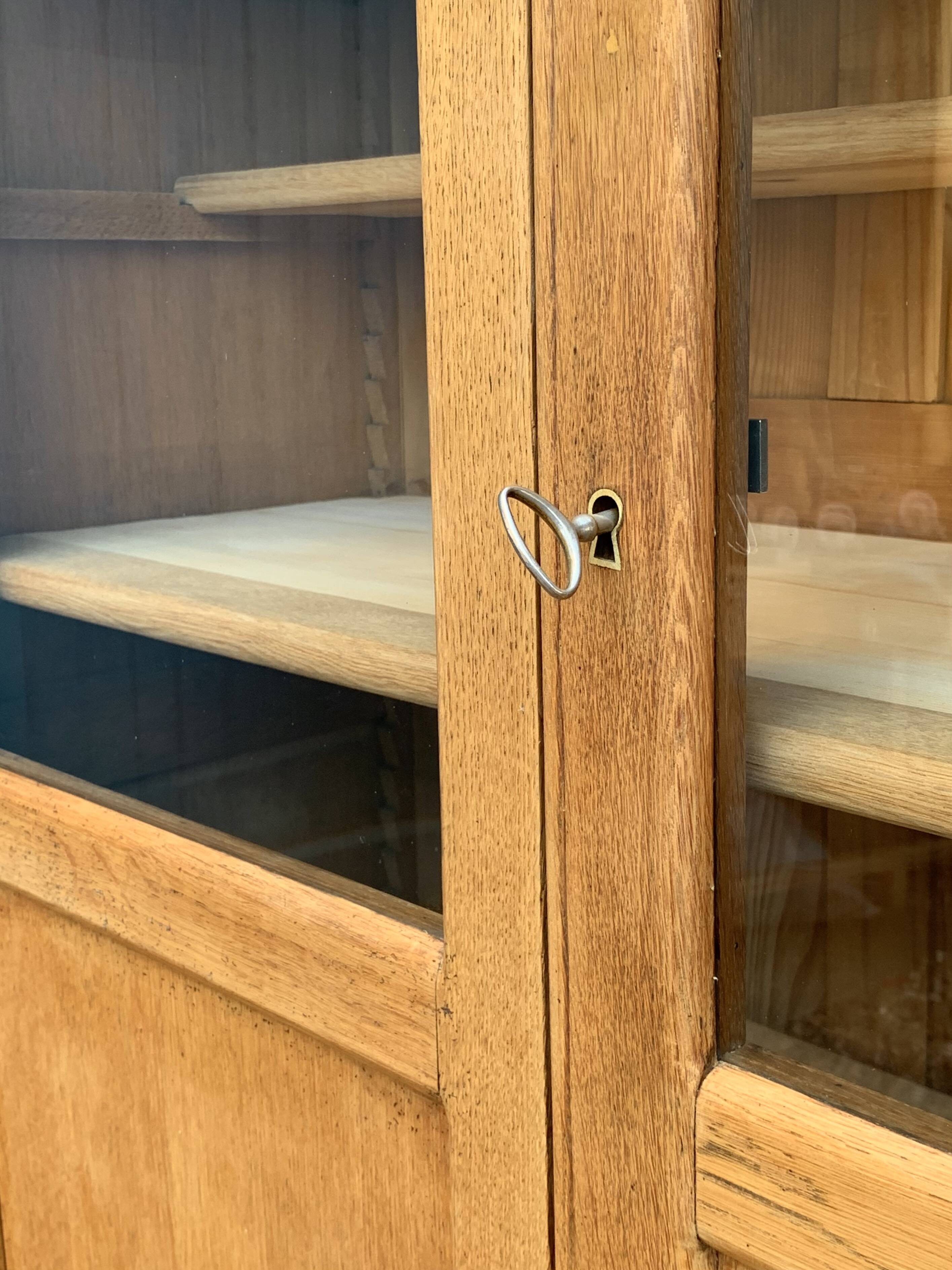 Parisian glass cabinet in solid raw oak, 1950