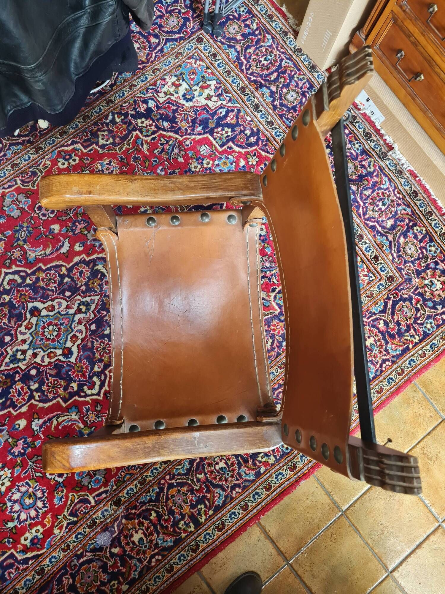 Frailero armchair, antique Spanish — carved wood & full-grain leather throne.