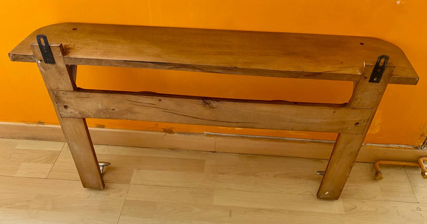 Wall-mounted coat rack with vintage hooks