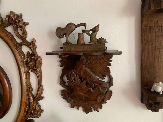 Black Forest carved wooden wall console, harness with wolf decoration