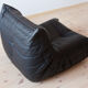 Armchair and ottoman in black leather model designed by Michel Ducaroy 1973
