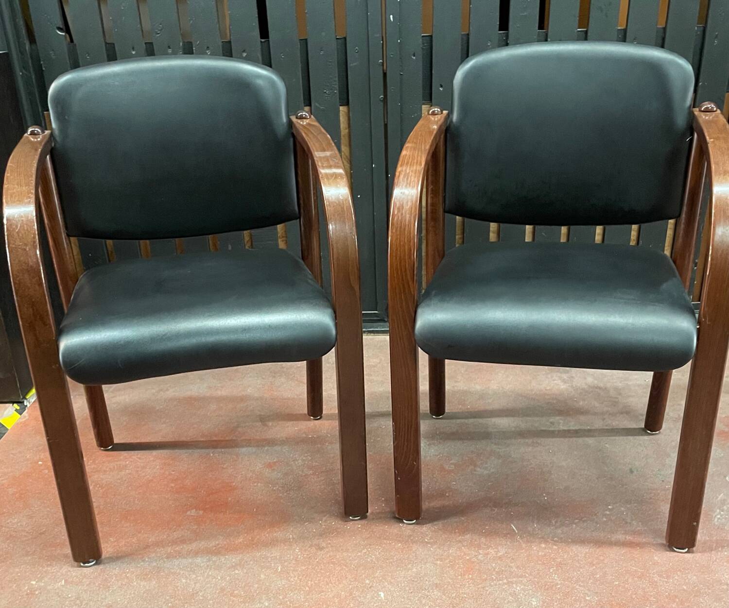 Pair of wooden and leatherette armchairs from the 80s