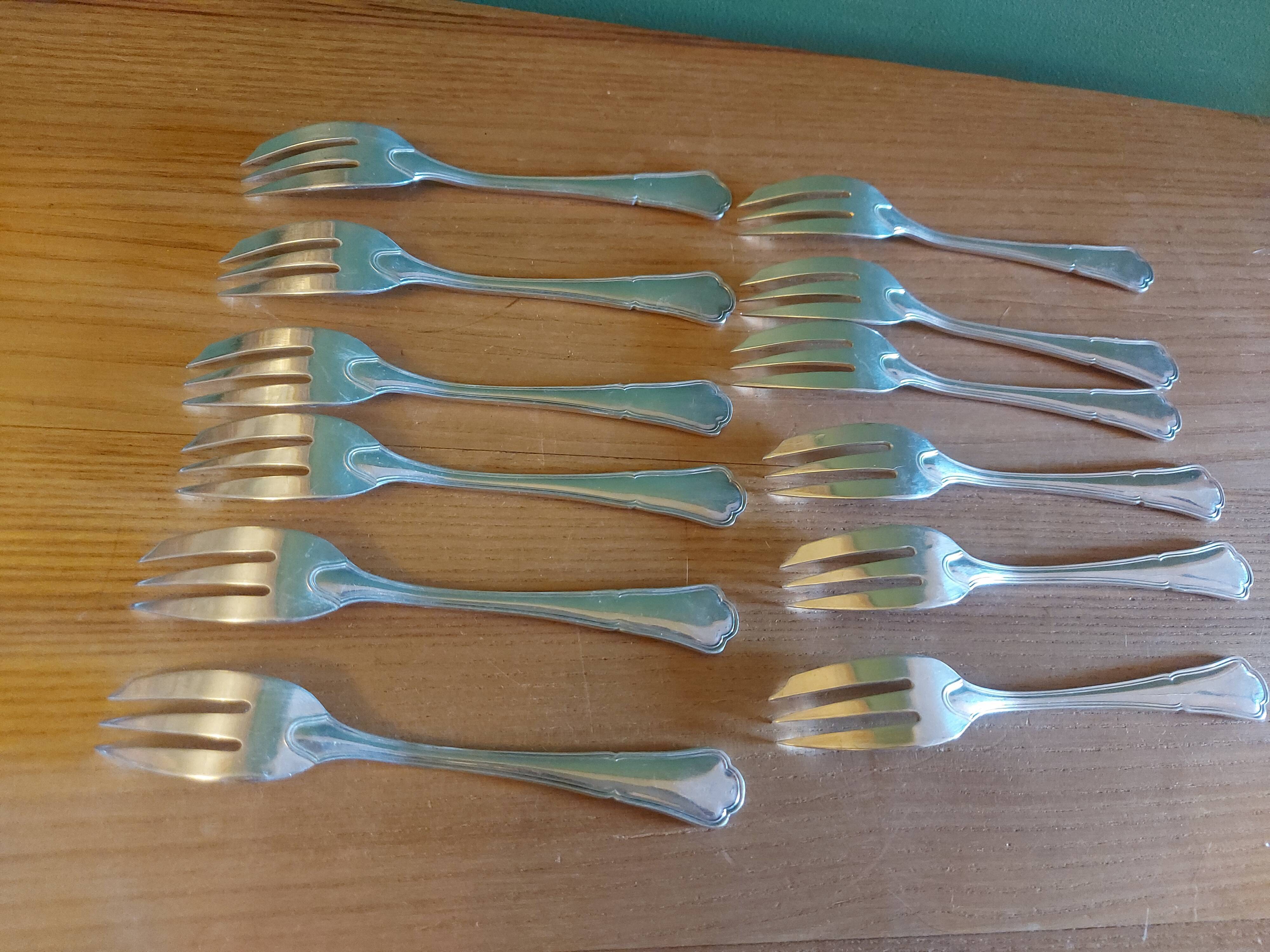 Box of 12 dessert forks in silver metal
