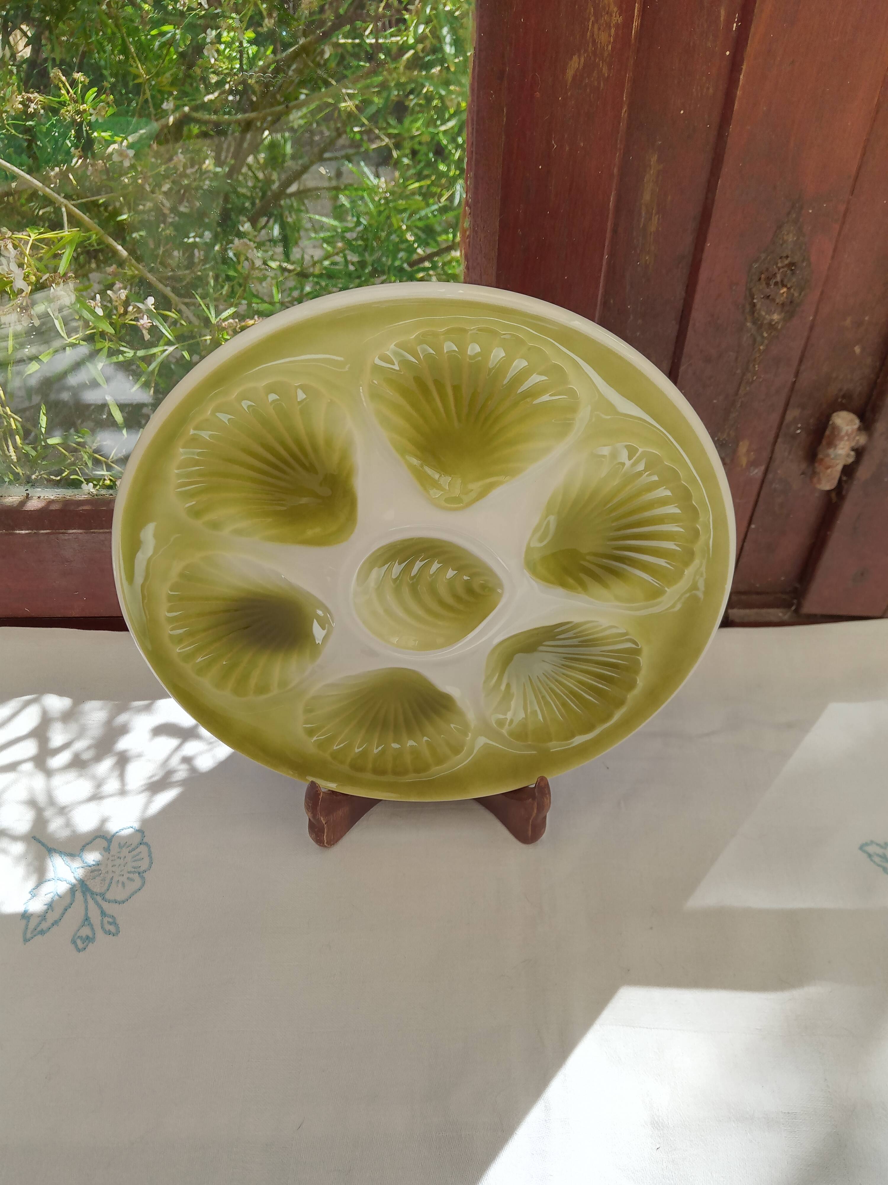 12 oyster plates and Moulin des loups dish