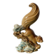 Ceramic squirrel on branch