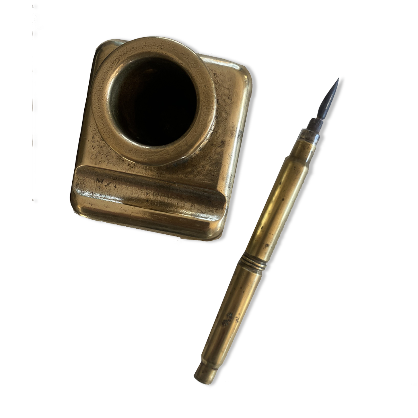 Brass inkwell and old feather holder