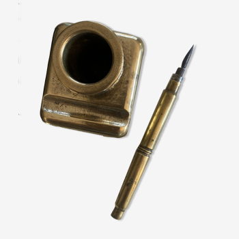 Brass inkwell and old feather holder