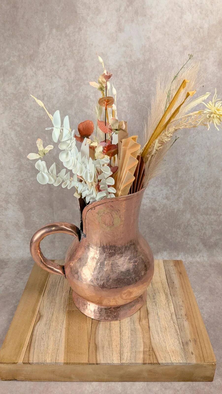 Antique hammered copper jug