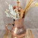 Antique hammered copper jug