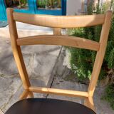 3 Scandinavian-style chairs, light wood and black faux leather