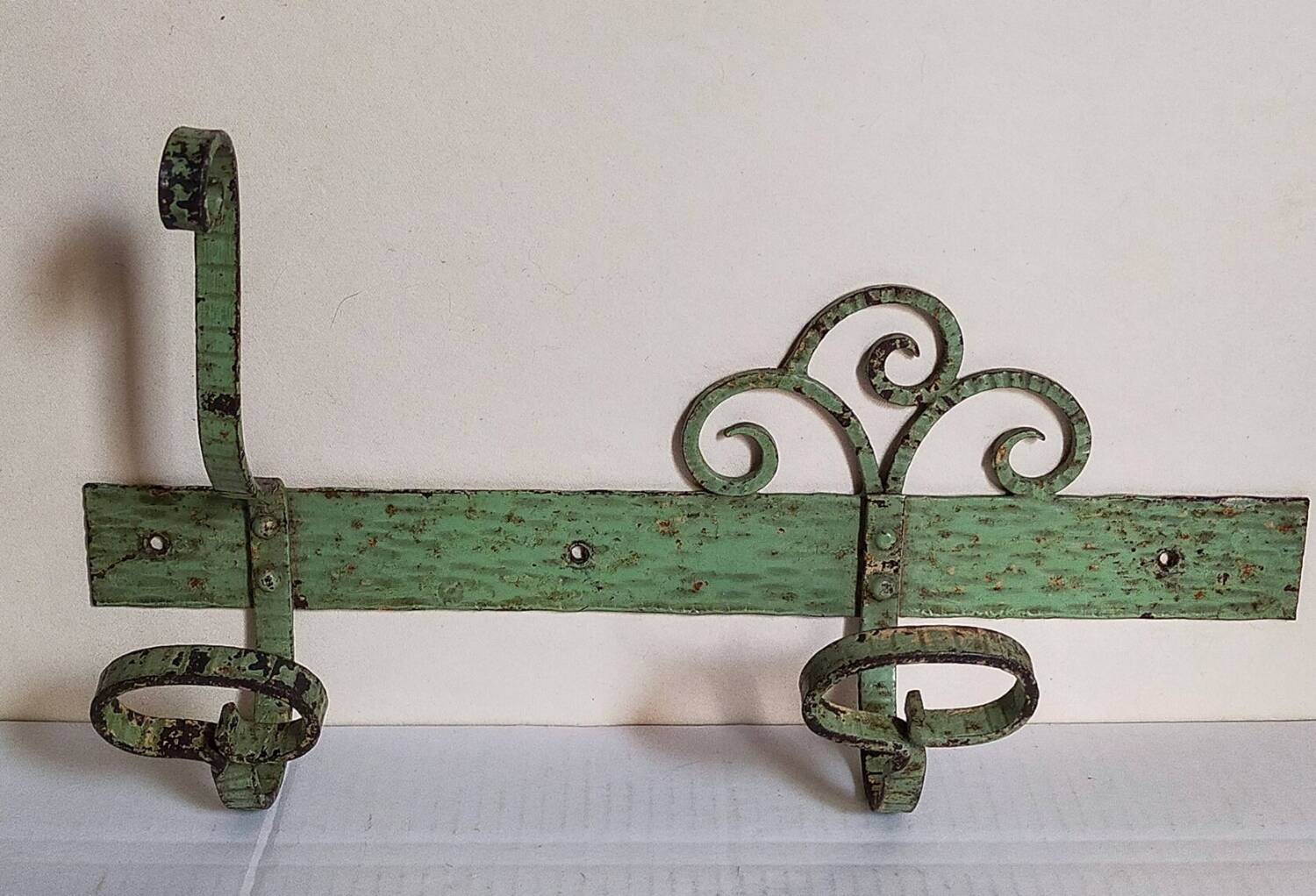Wrought iron coat rack