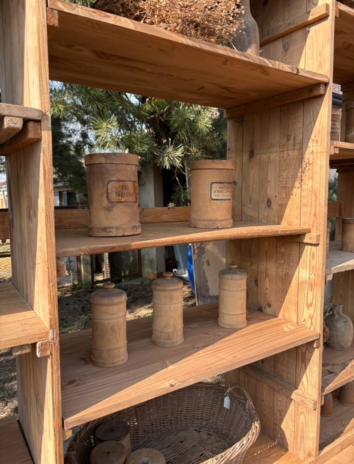Large antique workshop furniture with drawers and shelves.