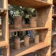 Large antique workshop furniture with drawers and shelves.