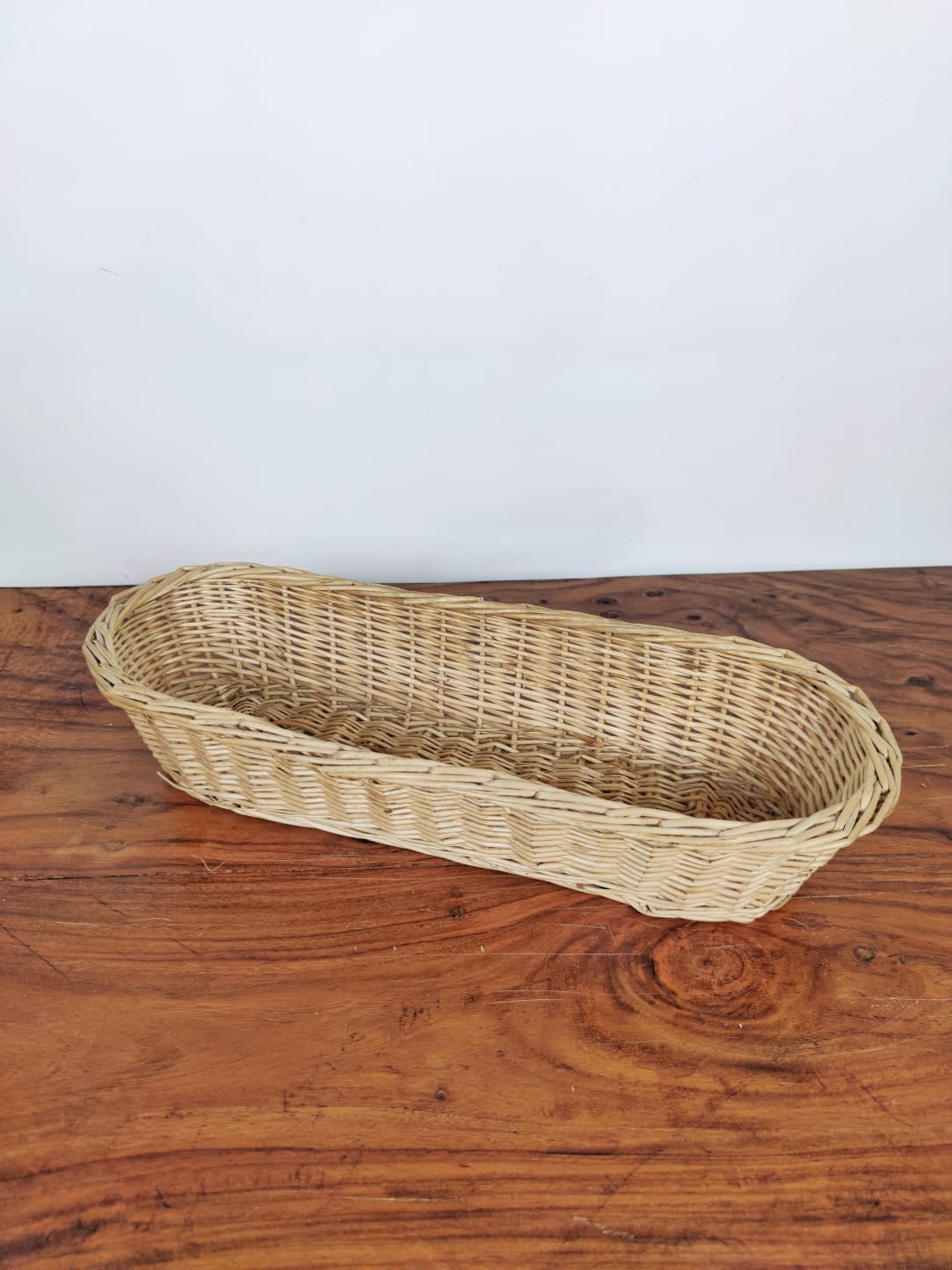 Beige wicker bread basket