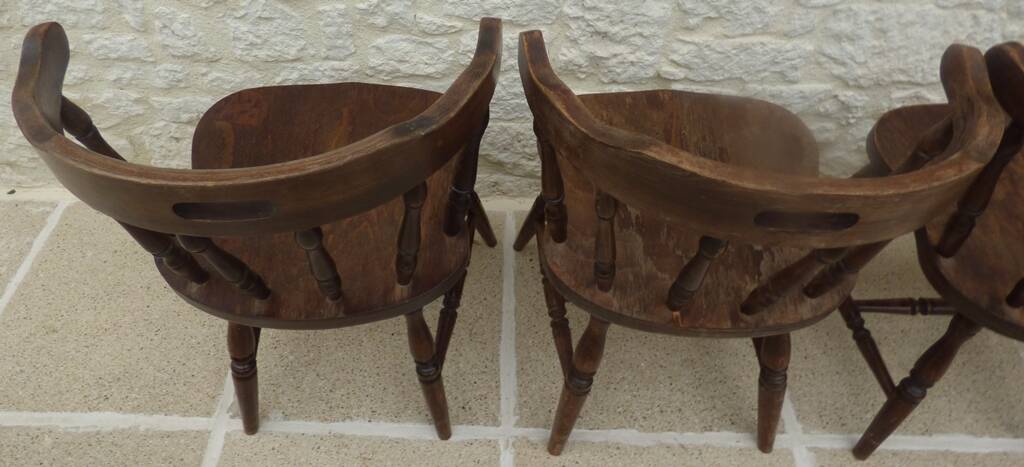 4 solid wood western-style "smoker's chairs" made of oak