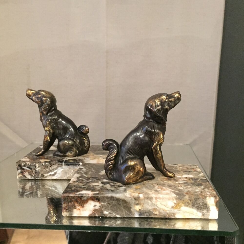 Pair of regular bookends representing dogs marble base