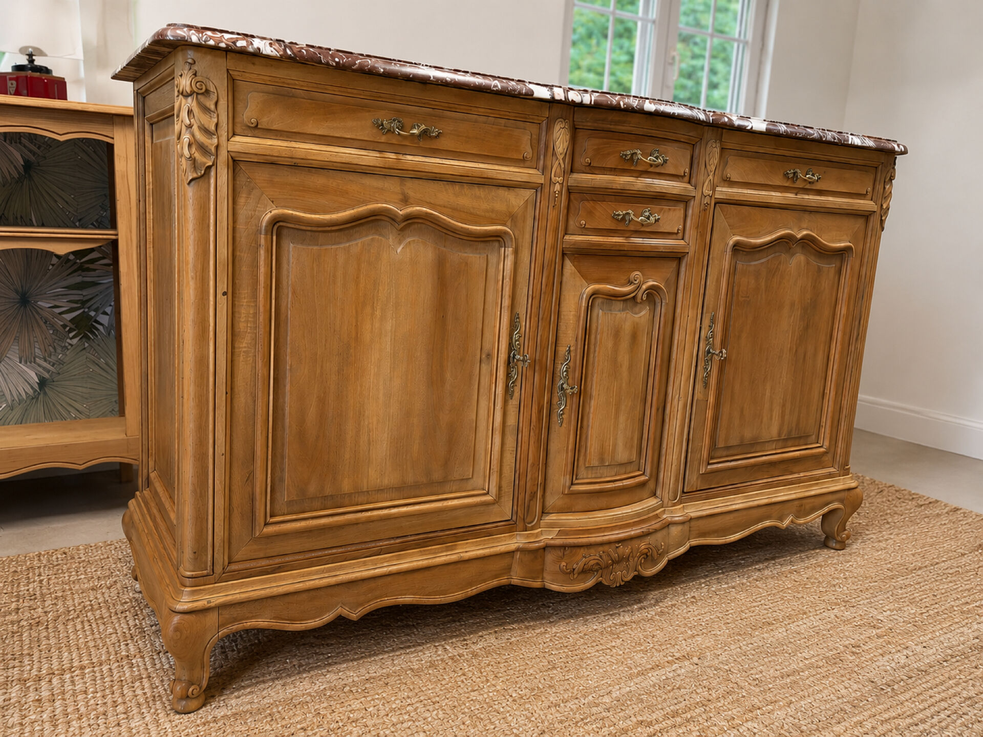 Curved walnut sideboard