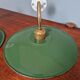 Pair of industrial wall lights in brass and green enameled sheet metal