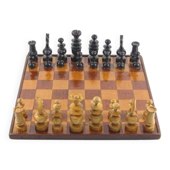Antique wooden chess set and board