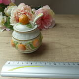 Orange jam jar with spoon 1988