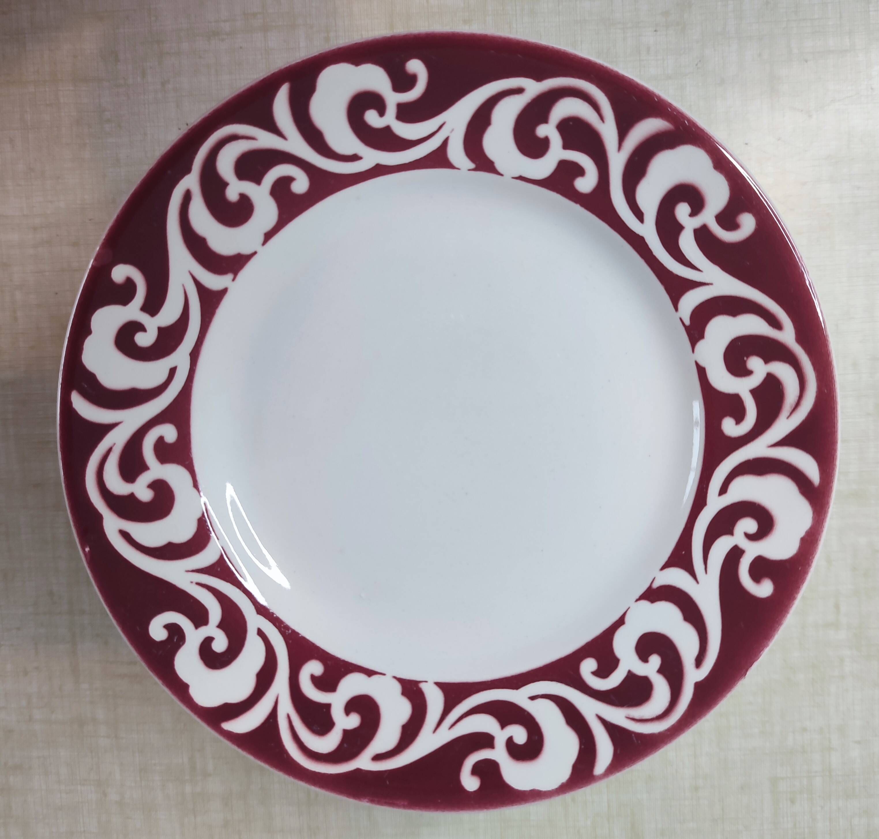 Lot of 17 vintage porcelain plates and a platter from the 1940s