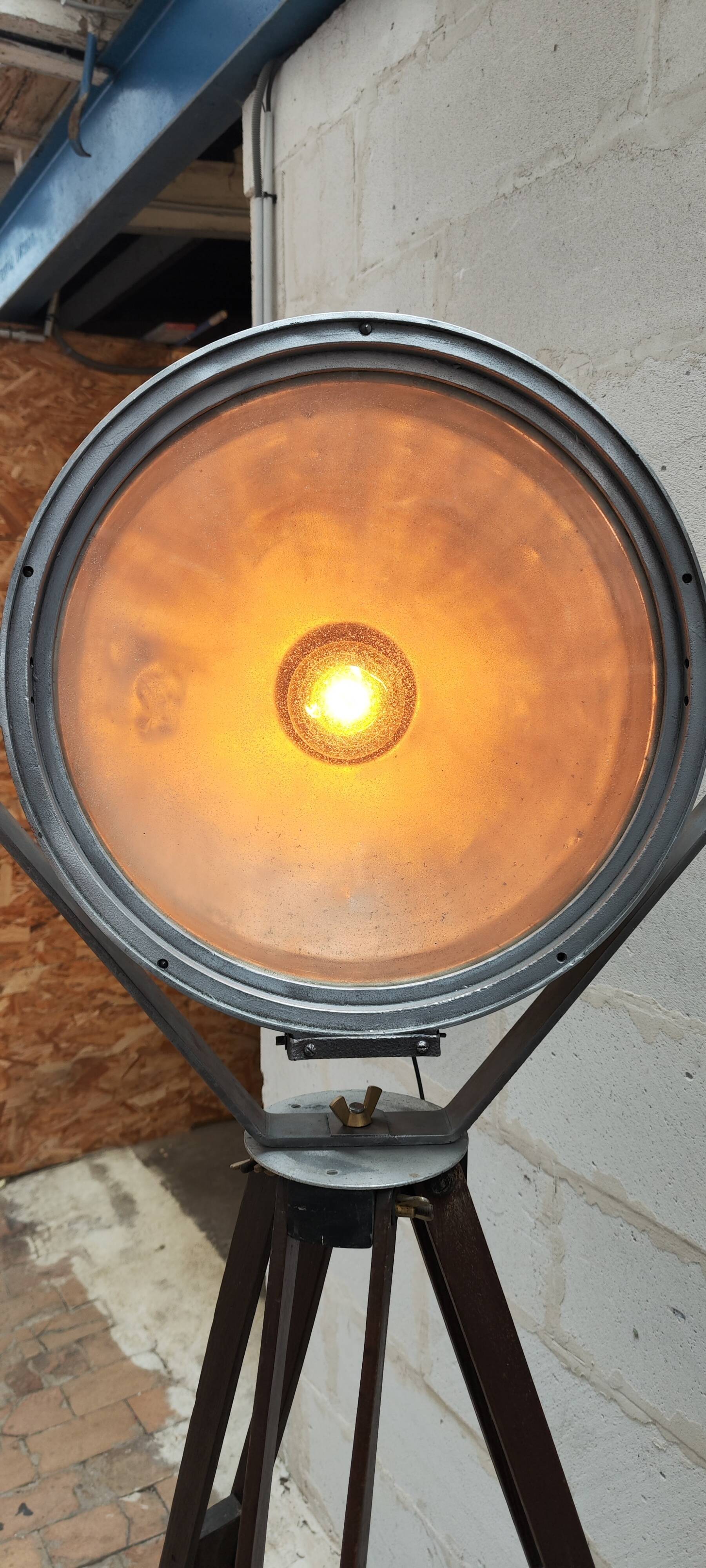 Old Mazda projector on wooden tripod