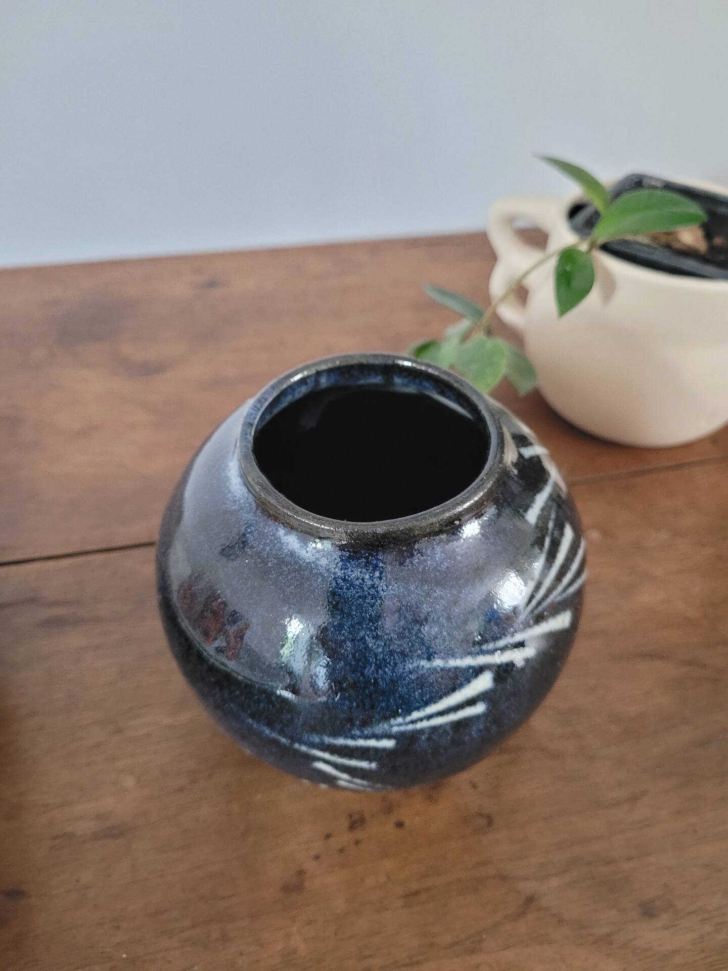Glazed stoneware round vase
