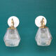 Pair of brass gooseneck wall sconces and glass globe vintage porcelain rosette