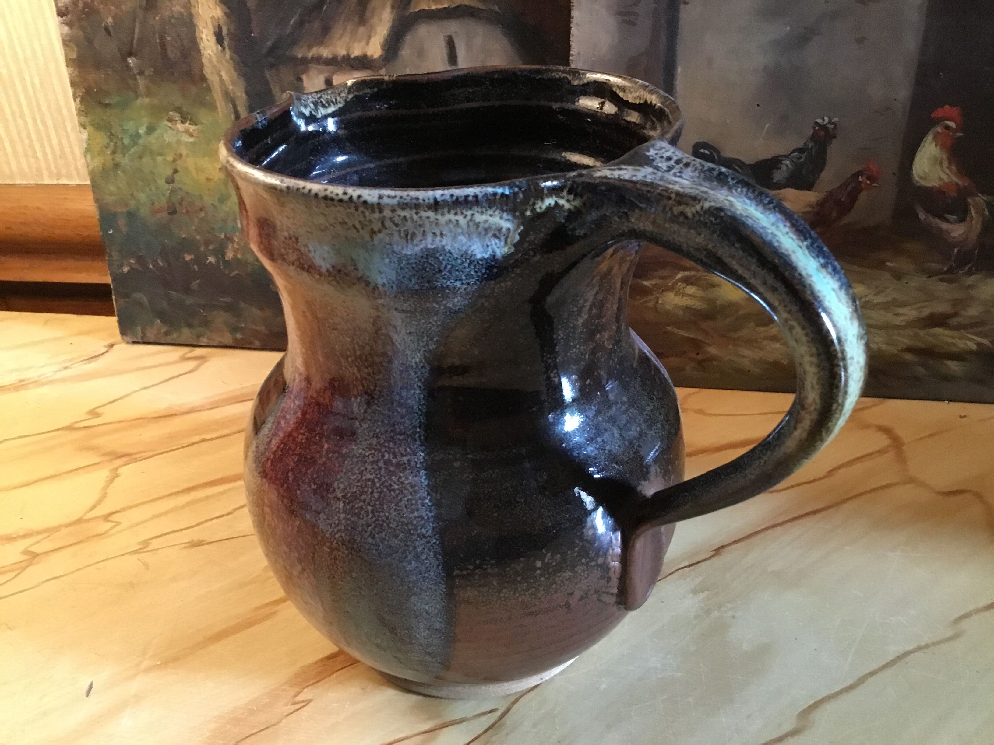 Signed varnished sandstone pitcher
