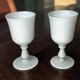 Pair of footed glasses in white opaline from around 1960.