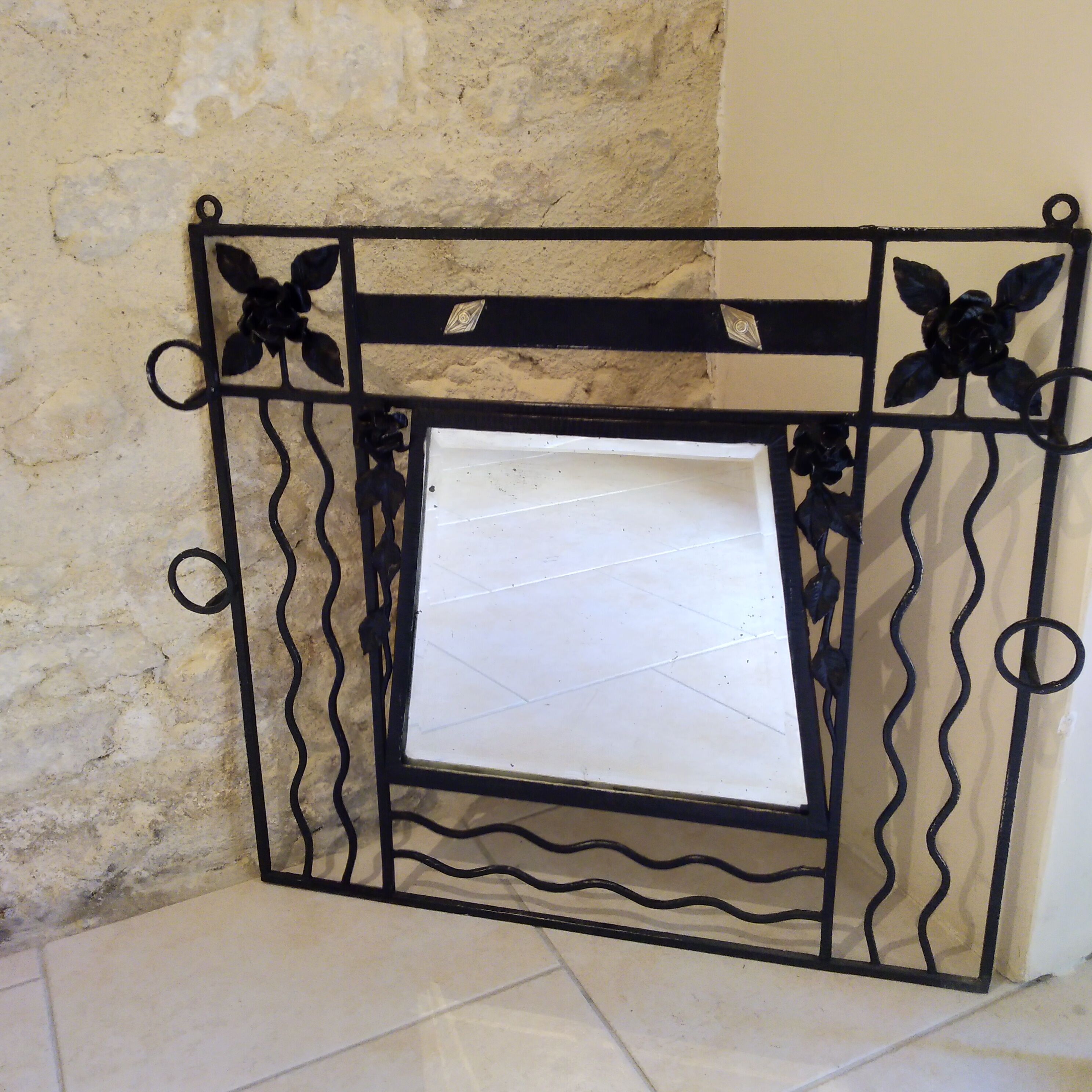 Art deco wrought iron coat holder