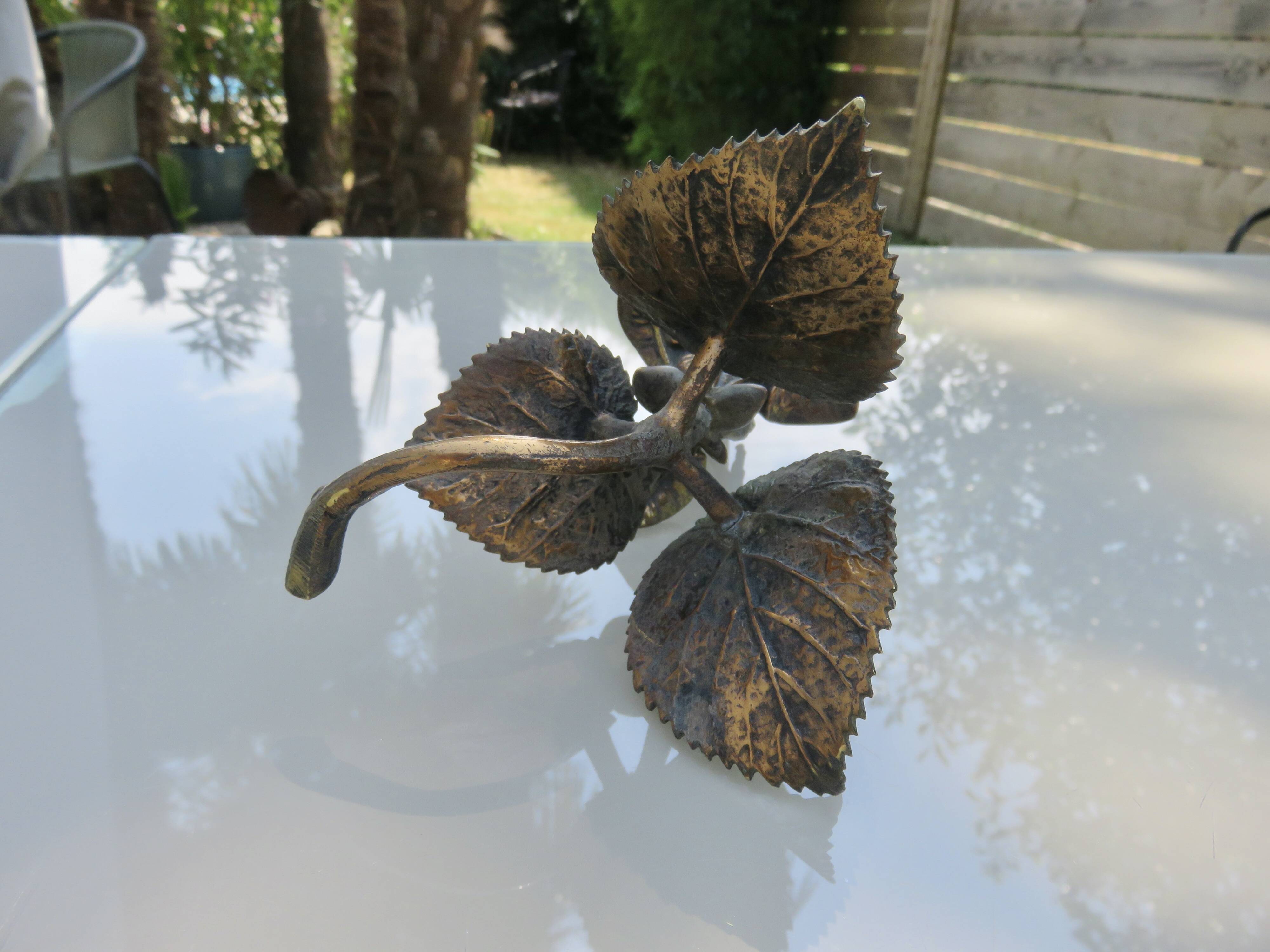 Floral bronze candlestick, Art Nouveau style, 1930s-1940s.