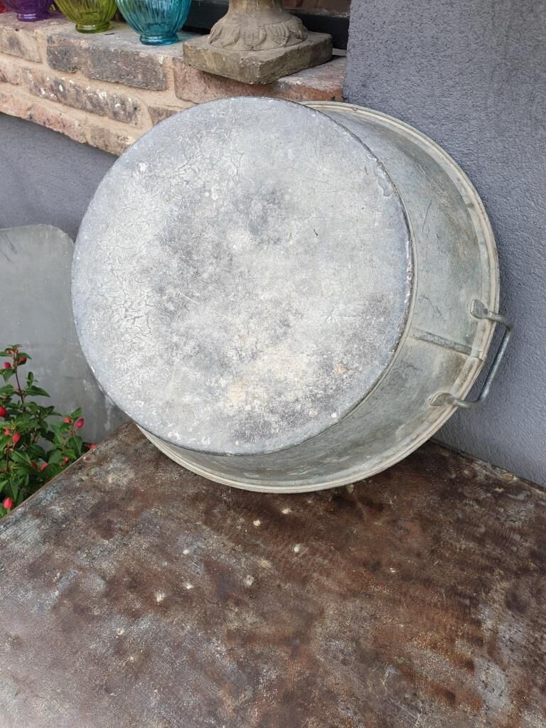Old zinc basin with handles