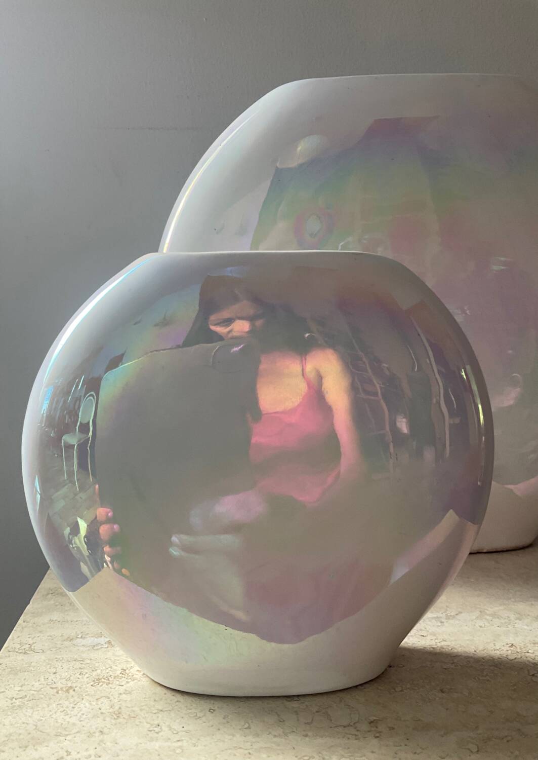 Duo of vintage round vases in iridescent ceramic