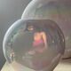 Duo of vintage round vases in iridescent ceramic