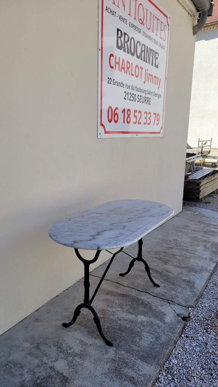 Cast iron bistro table and old oval marble top