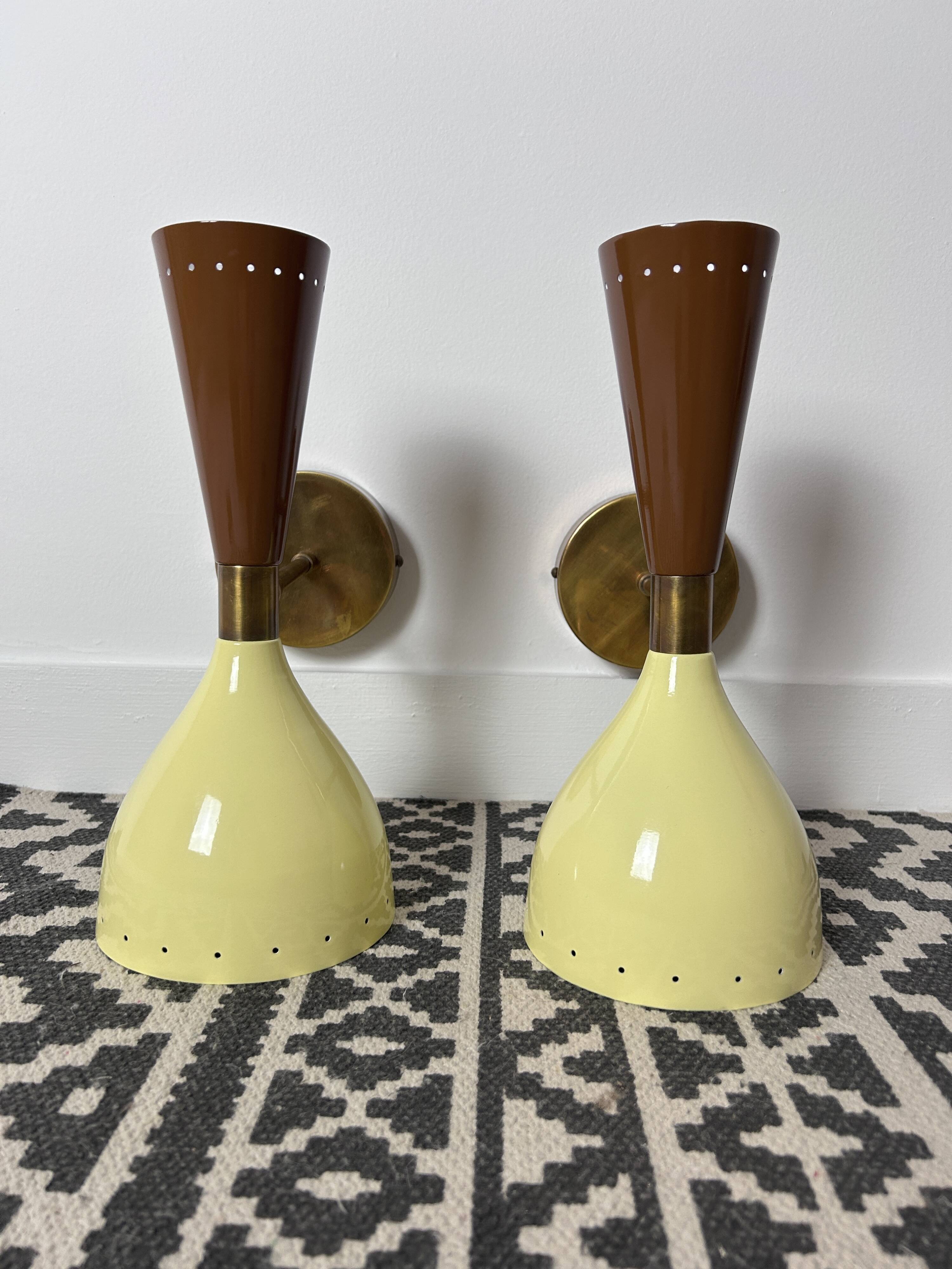 Pair of metal diabolo wall lights