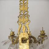 Two bronze and cut glass wall-mounted chandeliers